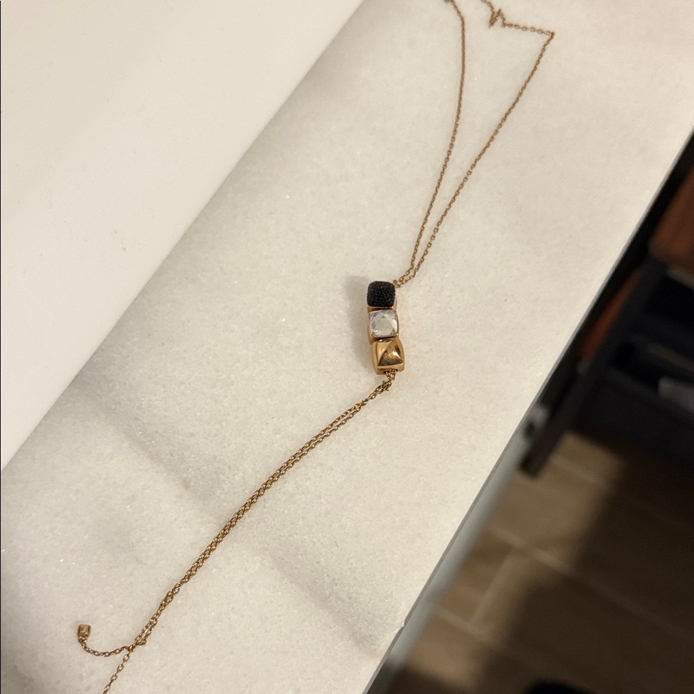 Elegant Gold and Black Necklace
